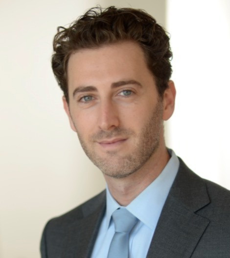 Headshot of David Diller in a suit and tie